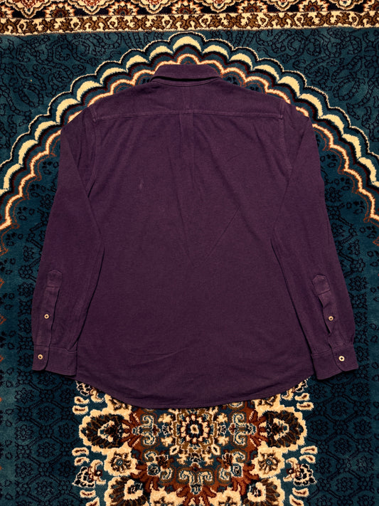 Assortment of preloved vintage clothing pieces from an online thrift store archive